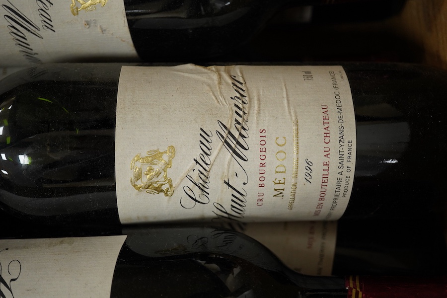 A case of twelve Chateau Haut-Maurac Medoc red wine, 1996. Condition - unknown storage